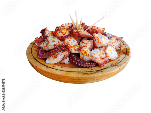 Pulpo a la gallega in Spanish meaning Galician-style octopus  or polbo a feira meaning fair-style octopus in gallego a traditional Galician dish. Isolated transparent png.  photo