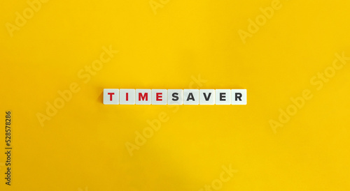 Time Saver Phrase on Letter Tiles on Yellow Background. Minimal Aesthetics.