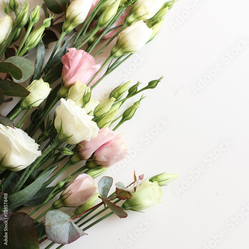 Fototapeta Naklejka Na Ścianę i Meble -  a bouquet of flowers in pastel colors on a white background