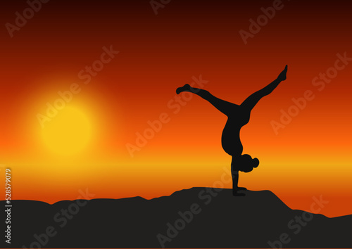 silhouette of a yoga girl at sunset