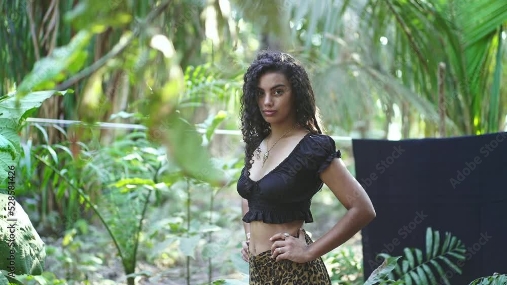 Generation z fashion. Beautiful young hispanic girl in rainforest jungle. Concept of fashion magazine photoshoot, summer collection, natural beauty confident model. Slow motion 4k
Generation z fashion. Beautiful young hispanic girl in rainforest jungle. Concept of fashion magazine photoshoot, summer collection, natural beauty confident model. Slow motion 4k