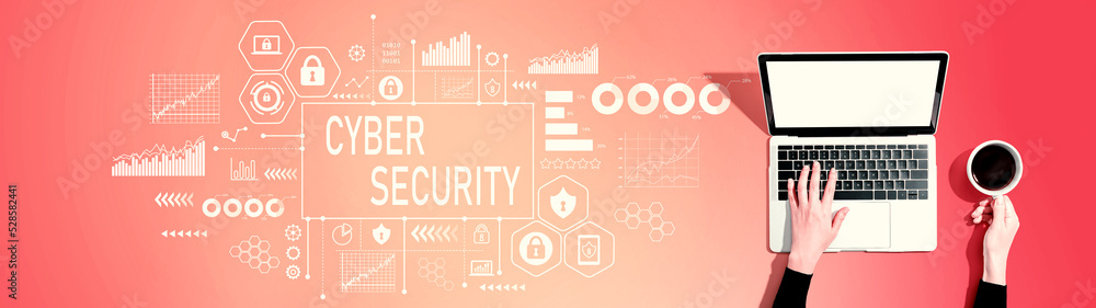 Cyber security theme with person using a laptop computer Cyber security theme with person using a laptop computer