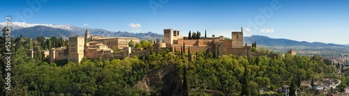 Panorama view of Alhambra with Sierra Navada inthe background, in Granada, Spain.