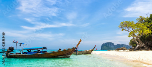 Fototapeta Naklejka Na Ścianę i Meble -  Amazing view of beautiful beach with traditional thailand longtale boat. Location: Bamboo island, Krabi province, Thailand, Andaman Sea. Artistic picture. Beauty world.