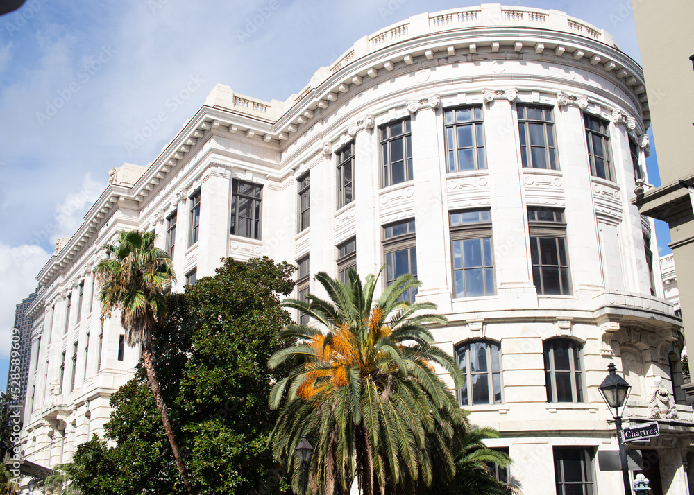 This elegant building in the French Quarter happens to be a Supreme court. I love the wrap around look to this building and the palm trees that sit beside it. This elegant building in the French Quarter happens to be a Supreme court. I love the wrap around look to this building and the palm trees that sit beside it.