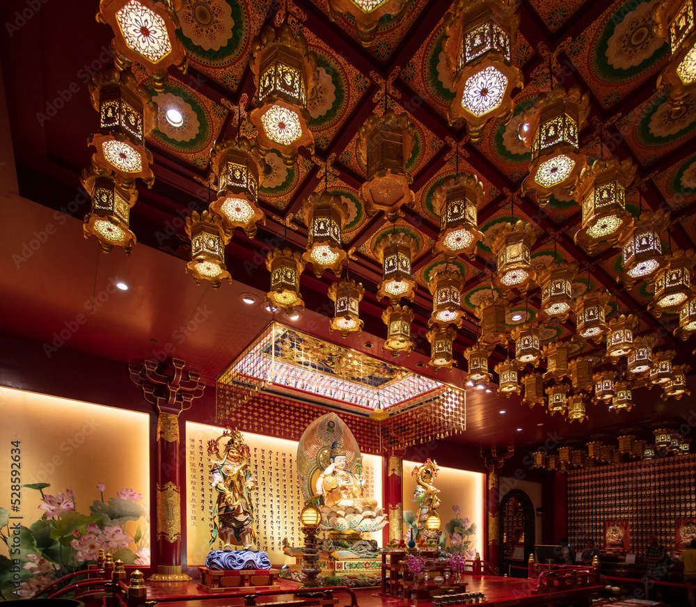 Fototapeta premium The statues of Buddha at The Buddha Tooth Relic Temple, Singapore.