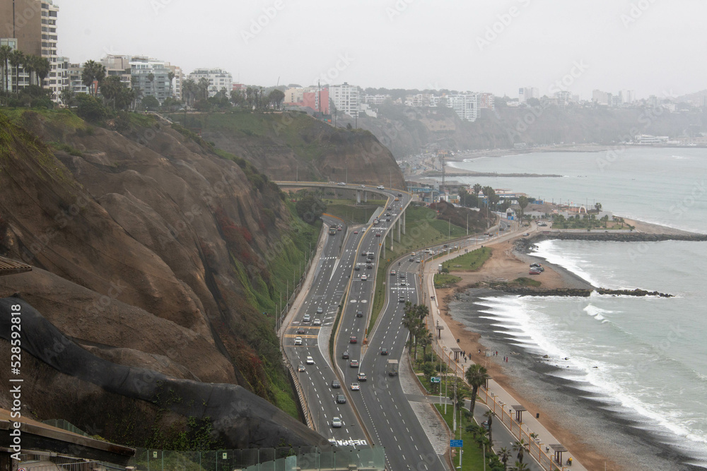 Malecon in the city of Lima, in its grey winter days, overlooking the road and the sea. Peru. 