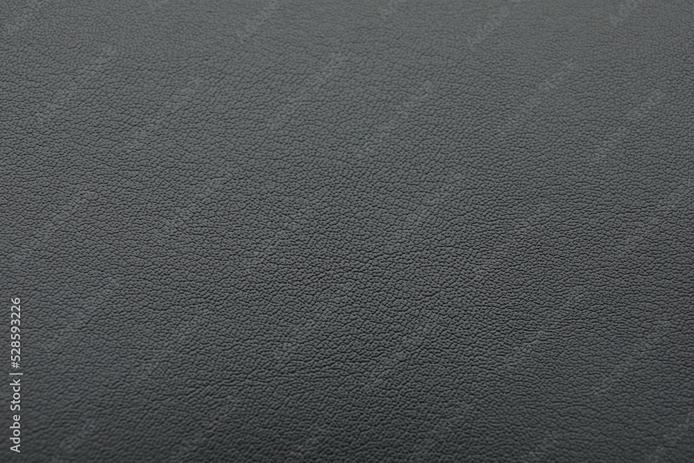 Texture of dark grey leather as background, closeup Texture of dark grey leather as background, closeup