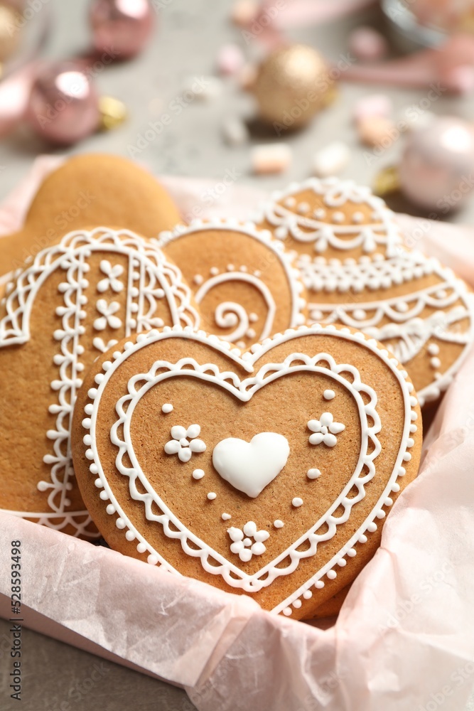 Tasty heart shaped gingerbread cookies in box, closeup Tasty heart shaped gingerbread cookies in box, closeup
