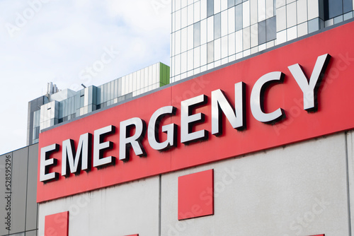 Emergency signage for and entrance to hospital emergency department