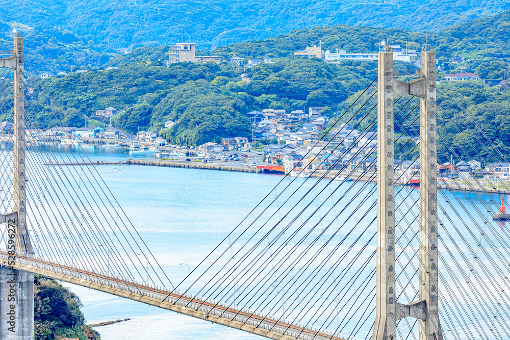 Obraz premium 夏の風の見える丘公園から見た呼子大橋 佐賀県唐津市 Yobuko Bridge from Kazeno Mieruoka Park. Saga Prefecture Karatsu city.