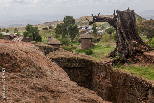 Rouds houses seen from a rock-cut church in Lalibela, Ethiopia photo