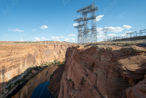 Expansive Canyon with Power Lines from the Glen Canyon Dam View Under a Clear Blue Sky at Midday