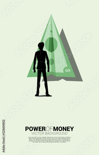 Silhouette of businessman standing with paper airplane from money bank note. Business Concept of Financial movement theme.