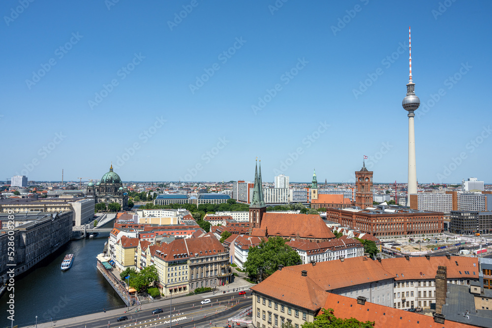 View of Berlin Mitte with the famous TV Tower, the cathedral and the town hall on a sunny day