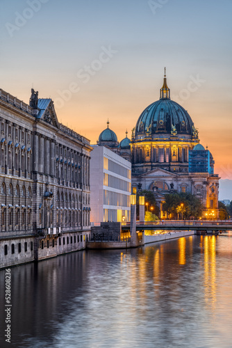 View along the River Spree in Berlin at dusk with the Cathedral in the back