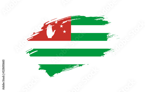 Creative hand drawn grunge brushed flag of Abkhazia with solid background