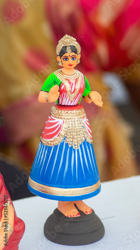 Thanjavur Doll Terra-cotta Doll, Indian toy and traditional dress and ornaments in a Natural background.