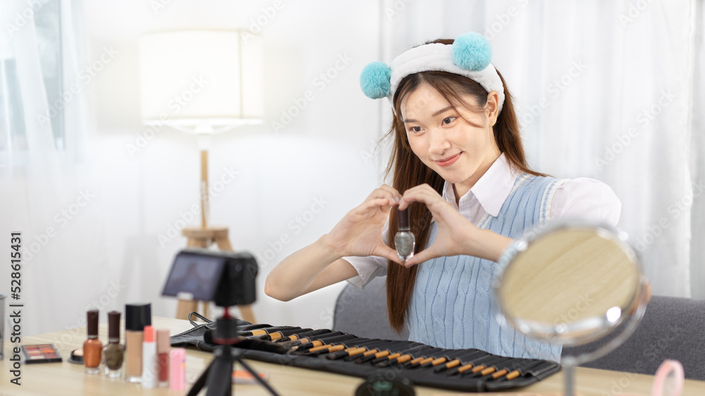 Beautiful women with social media influences recommend products and make-up accessories to be more beautiful, Recording vlog video live streaming, Online business of beauty bloggers. Beautiful women with social media influences recommend products and make-up accessories to be more beautiful, Recording vlog video live streaming, Online business of beauty bloggers.