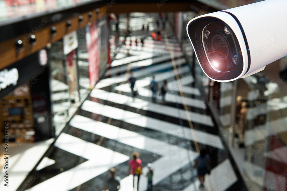 IOT CCTV, security indoor camera motion detection system operating with people shopping at shopping mall, cctv solution management system, surveillance security, safety intelligent technology concept IOT CCTV, security indoor camera motion detection system operating with people shopping at shopping mall, cctv solution management system, surveillance security, safety intelligent technology concept