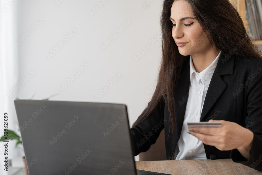 woman using credit card and laptop for buying online shopping working in office, online shopping payment woman using credit card and laptop for buying online shopping working in office, online shopping payment