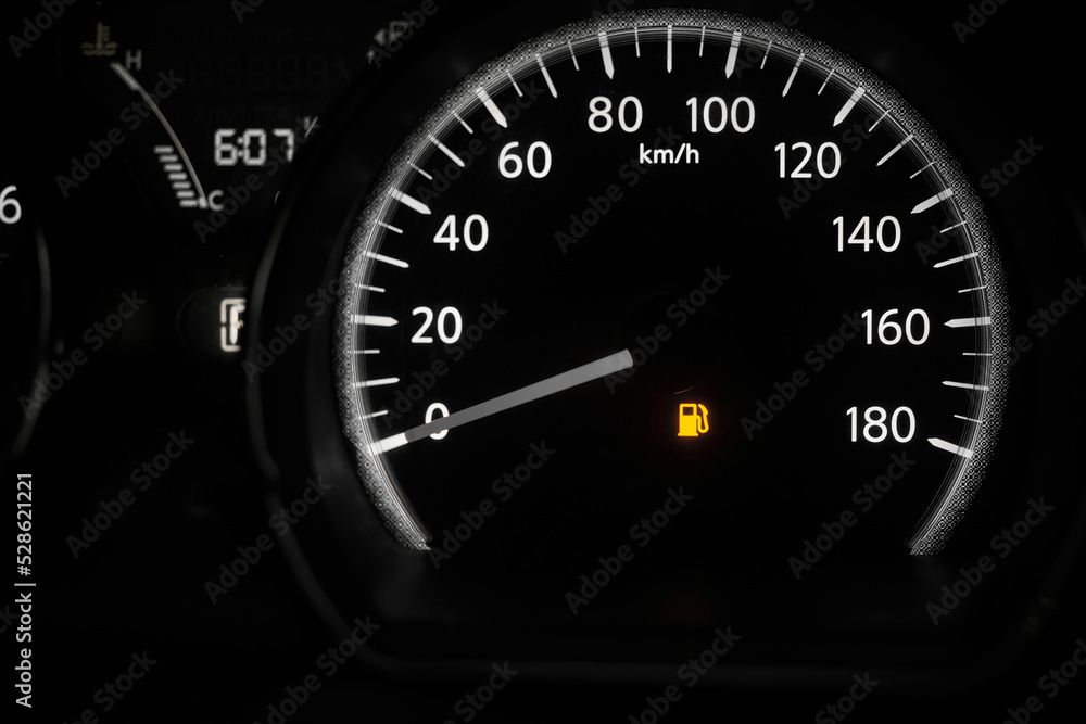 The car dashboard with a speedometer