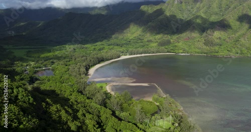 Kahana Bay below Crouching lion hike in Oahu, Hawaii, aerial view. photo