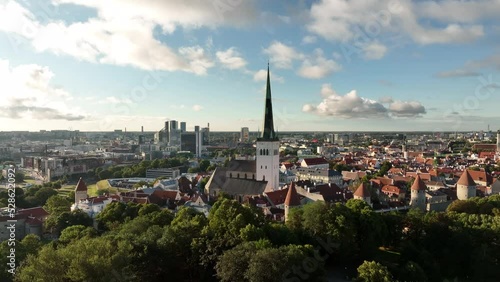 Beautiful panoramic aerial view of Tallinn old town with St. Olaf's Church in the centre. Estonia. Tallinn Old Town was inscribed as a UNESCO World Heritage Site in 1997. photo
