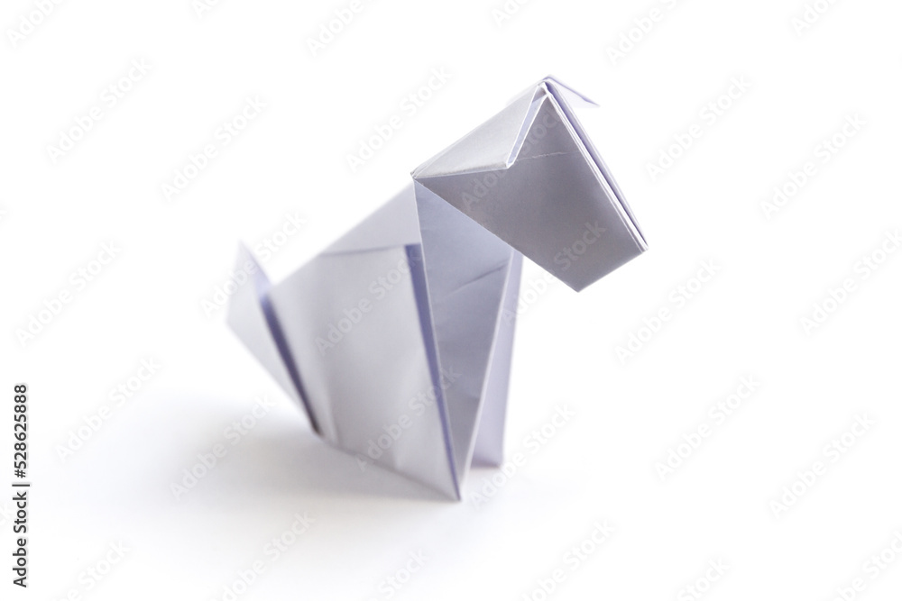 Paper dog origami isolated on a white background Paper dog origami isolated on a white background