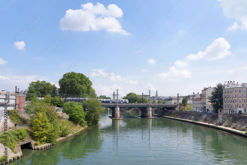 Aerial subway over the Marne river in Charenton-Le-pont city. Grand Paris area	