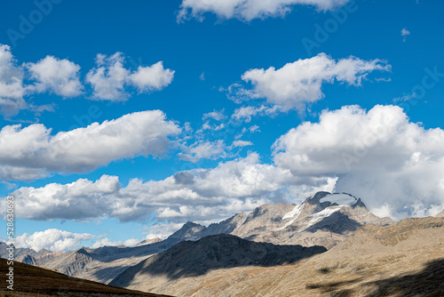 Mountains and clouds in the Gran Paradiso national park, Italy