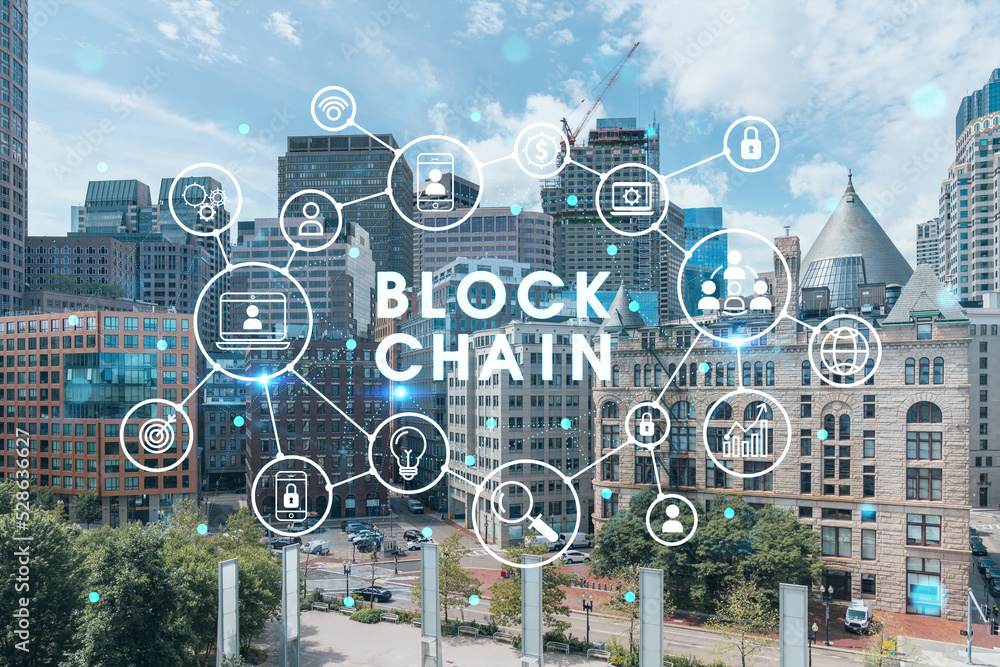 Obraz premium Panoramic picturesque financial downtown city view of Boston from Harbour area at day time, Massachusetts. technological and educational center. Blockchain and cryptography concept, hologram