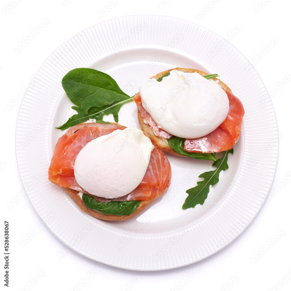 Cream cheese, Smoked salmon and poached egg toasts on a plate Cream cheese, Smoked salmon and poached egg toasts on a plate