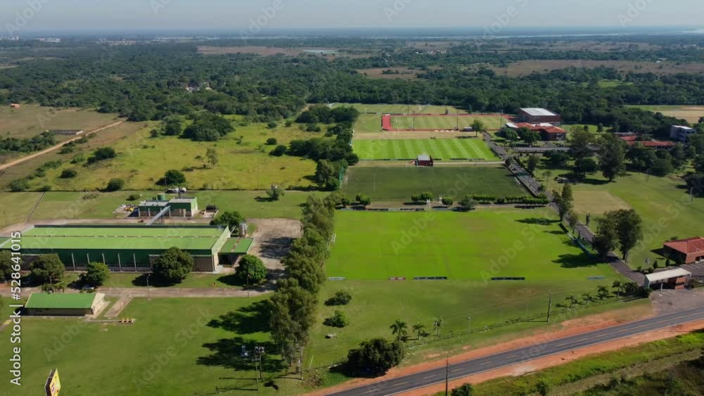 Aerial View Of High Performance Soccer Athletes, Green Grass Field, On A Sunny Day, Paraguay Aerial View Of High Performance Soccer Athletes, Green Grass Field, On A Sunny Day, Paraguay