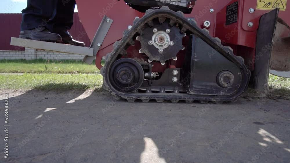 Close-up of excavator chain. construction mini excavator. Close-up of excavator chain. construction mini excavator.