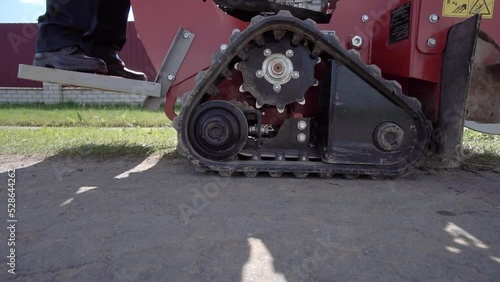 Close-up of excavator chain. construction mini excavator.