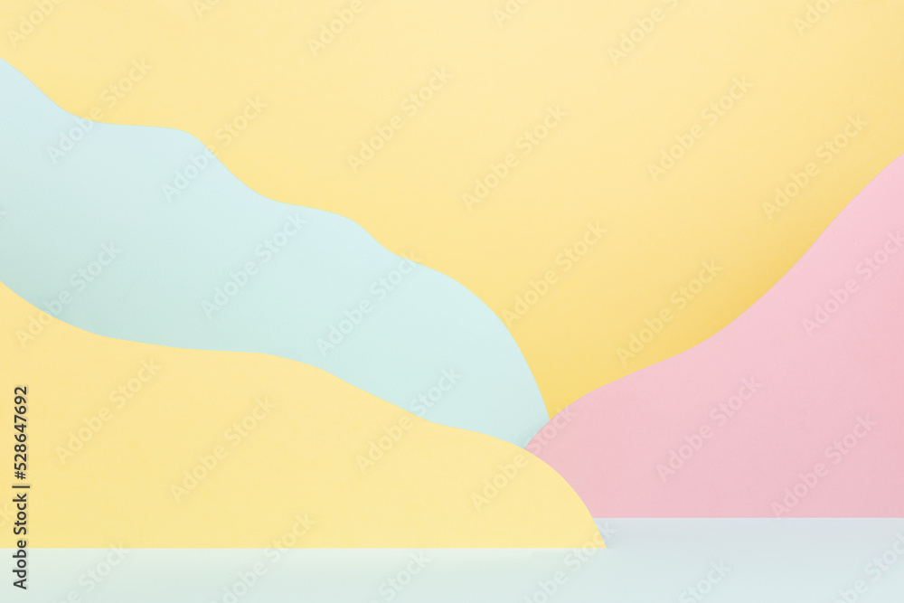 Fantasy cartoon landscape as abstract scene mockup with paper mountains in pink, yellow, mint color. Colorful background for advertising, design, card, presentation of cosmetic, gift, goods, poster.