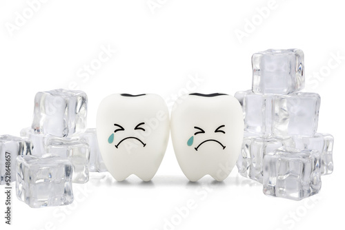 Tooth decay sensitive is crying with cold ice on white background ,Dental concept of tooth sensitivity from drinking cold water,with clipping path. photo