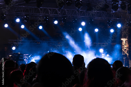 Spotlights on the stage. Night event or concert background photo