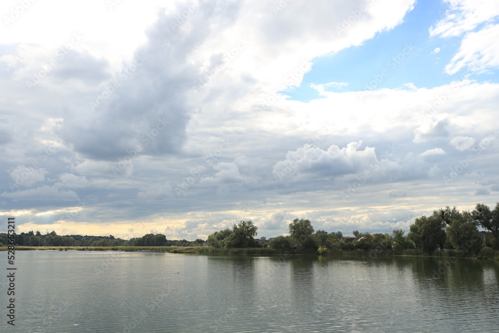 Landscape of a lake and cloudy sky