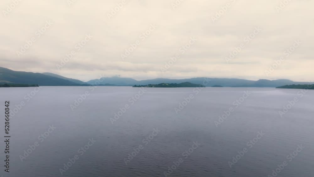 Ascending Pedestal Shot Of Loch Lomond On A Cloudy Day. Ascending Pedestal Shot Of Loch Lomond On A Cloudy Day.
