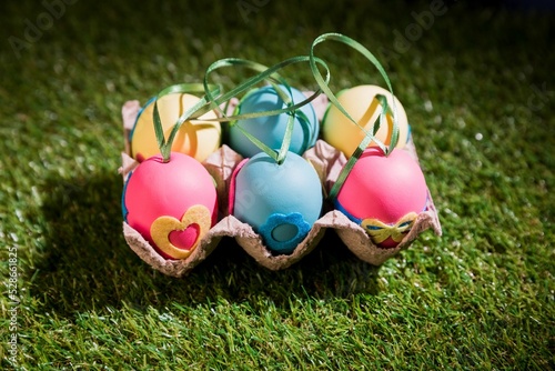 Decorated Easter eggs in crate