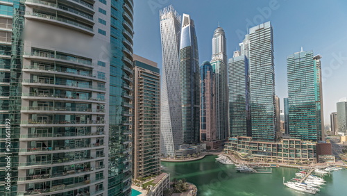 Canvas Print Panorama showing Dubai marina tallest skyscrapers and yachts in harbor aerial timelapse