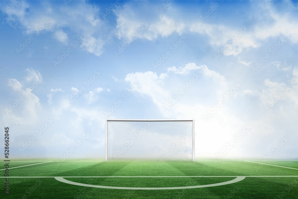 Football pitch under blue sky