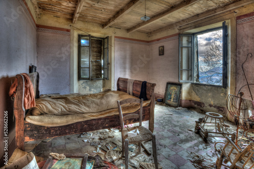Italy, September 2022. Bedroom of an abandoned house