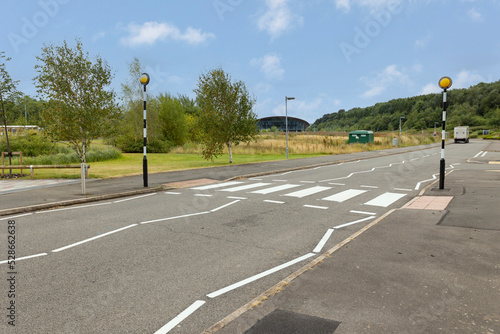 Top view on pedestrain crossing, asphalt and zebra crossing, crosswalk