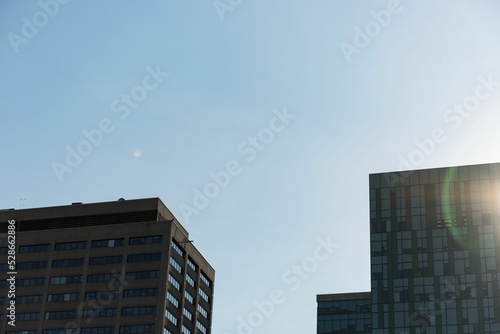 Office buildings against blue sky