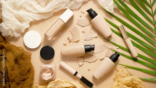 Wallpaper Mural Bottles of three different shades of makeup foundation on beige background with palm leaf Torontodigital.ca