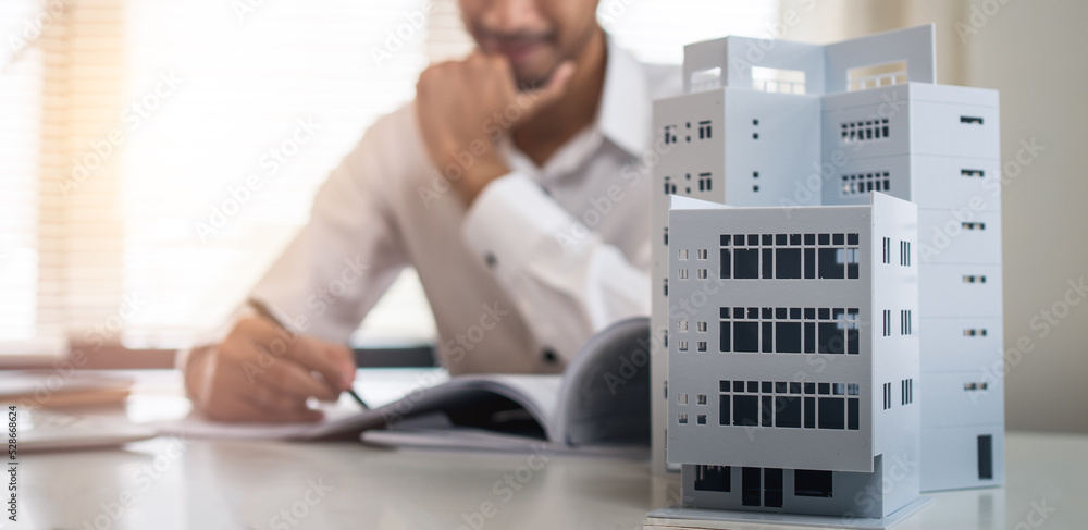Engineer work with architect drawing construction project Engineer work with architect drawing construction project