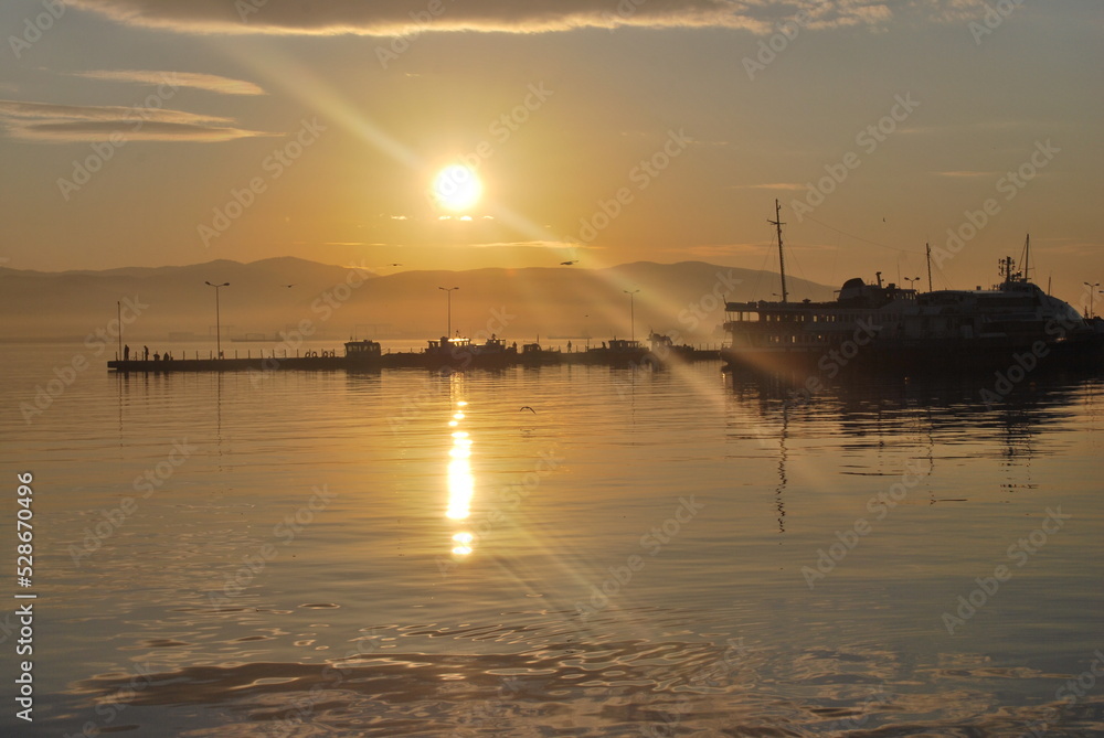 Naklejka premium Izmit, Kocaeli, Turkey; 12 December 2011, Sunset in izmit marina.
